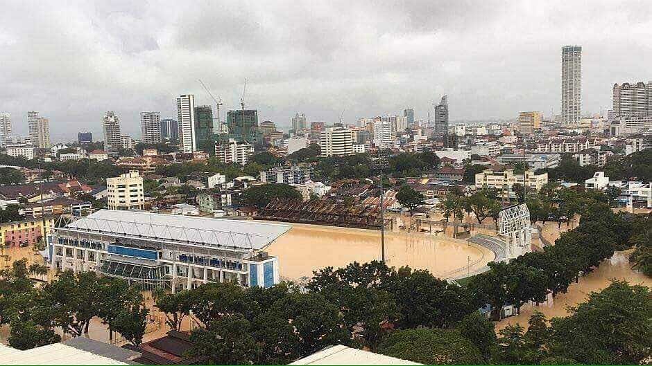 At least two people have been killed and almost 2,000 evacuated after a storm triggered serious flooding on Sunday in Malaysia's Penang, with the historic state capital under murky brown water. Picture courtesy Twitter