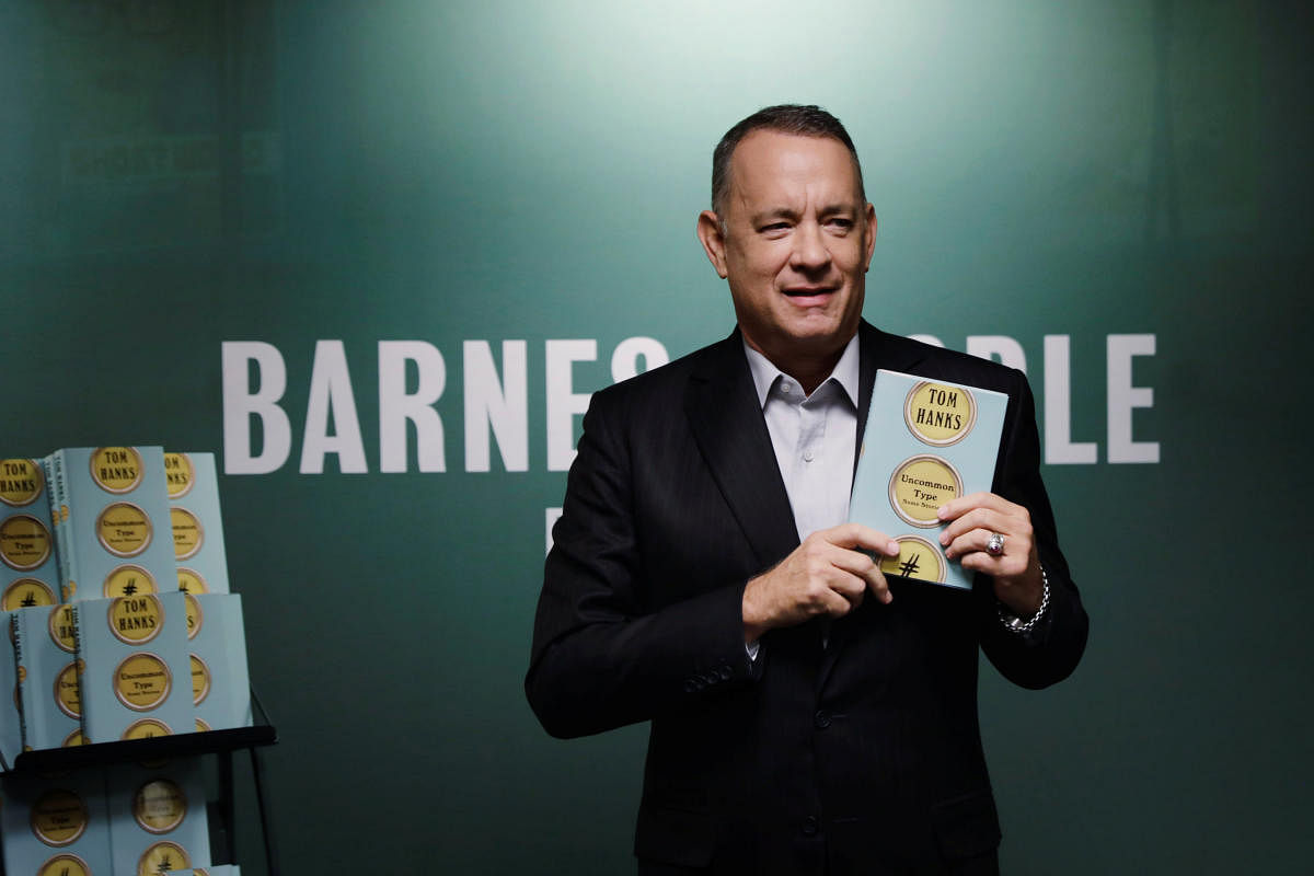 Tom Hanks played the matchmaker (or rather, match-confirmer) during a promotional event for his book. Reuters photo.