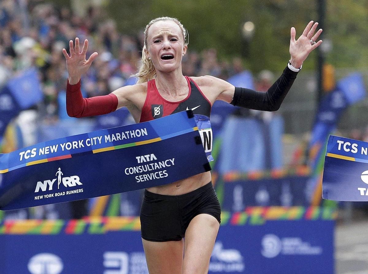 Shalane Flanagan of the United States wins the women's division of the New York City Marathon on Sunday. AP/ PTI