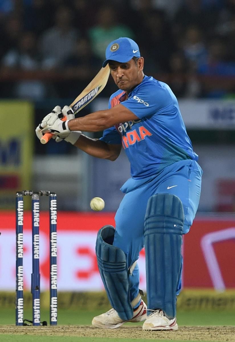 Rajkot:M S Dhoni plays a shot during the second T20 match against New Zealand in Rajkot on Saturday. PTI Photo by Shashank Parade (PTI11_4_2017_000218b)