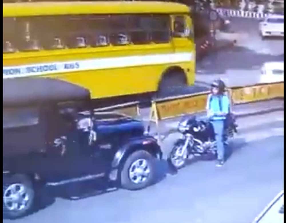 Screengrab of the CCTV footage showing the man stopping the driver from moving ahead.