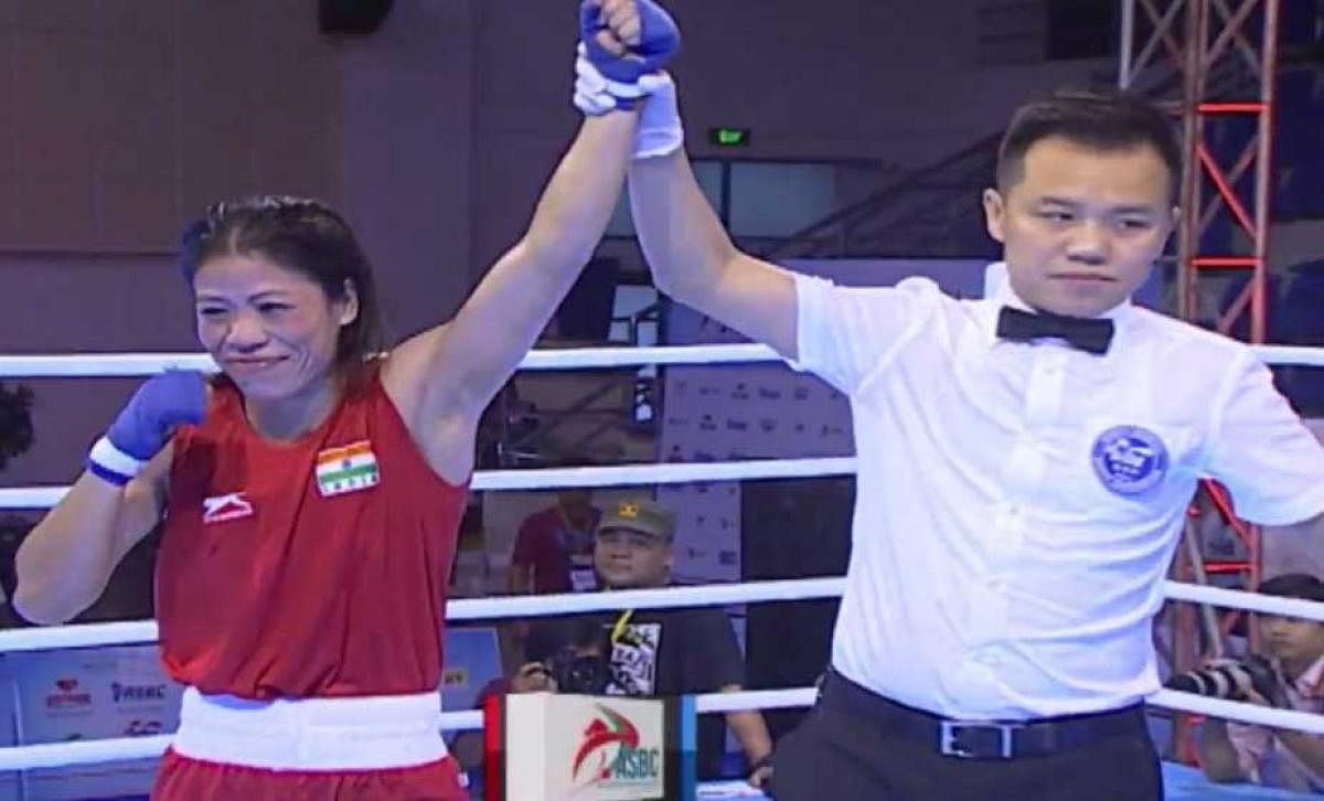 Indian boxing stalwart M C Mary Kom (48kg) clinched an unprecedented fifth gold medal but Sonia Lather (57kg) settled for silver at the Asian Championships, here today. Picture courtesy Twitter @ashokgehlot51