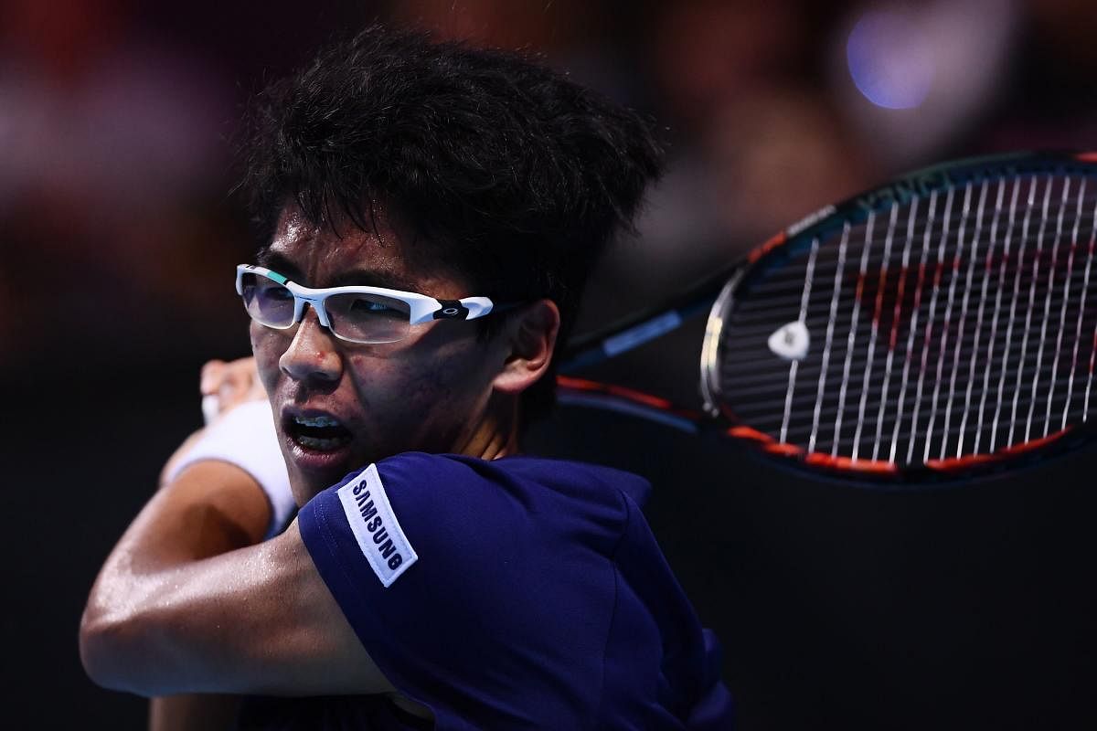 FINE START South Korea Hyeon Chung returns during his win over Russia's Andrey Rublev in the first edition of the Next Gen ATP Finals in Milan on Wednesday. AFP