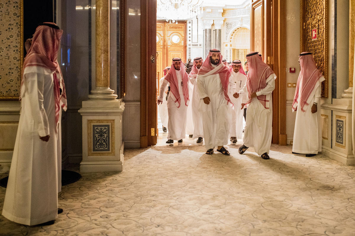FILE-- Crown Prince Mohammed bin Salman, second from right in foreground, arrives at the Future Investment Initiative in Riyadh, Saudi Arabia, Oct. 24, 2017. About 500 people have been detained without charge in a corruption crackdown ordered by the prince, but how corruption is defined in Saudi Arabia is unclear. (Tasneem Alsultan/The New York Times)