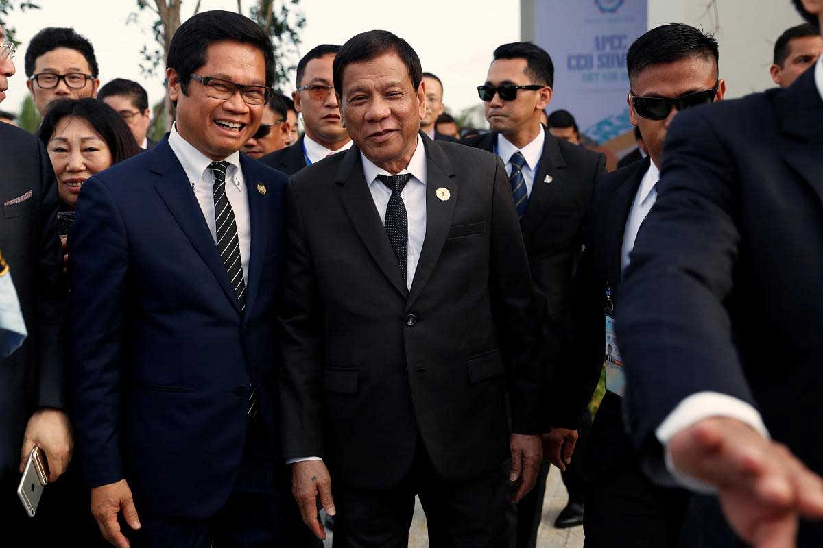 Philippines' President Rodrigo Duterte leaves the APEC CEO summit in Danang, Vietnam November 9 2017. REUTERS