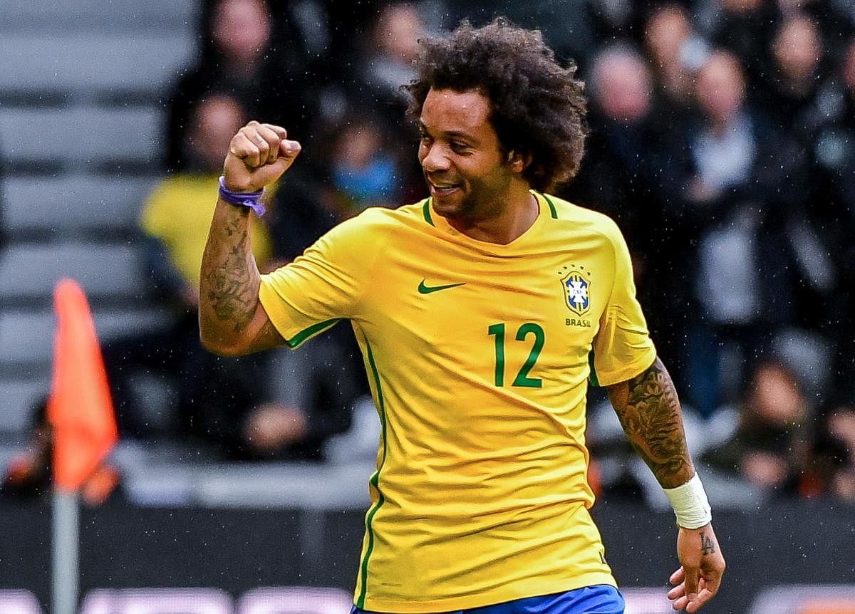 FINE STRIKE Brazil's Marcelo celebrates after scoring against Japan in a friendly at Lille, France on Friday. AFP