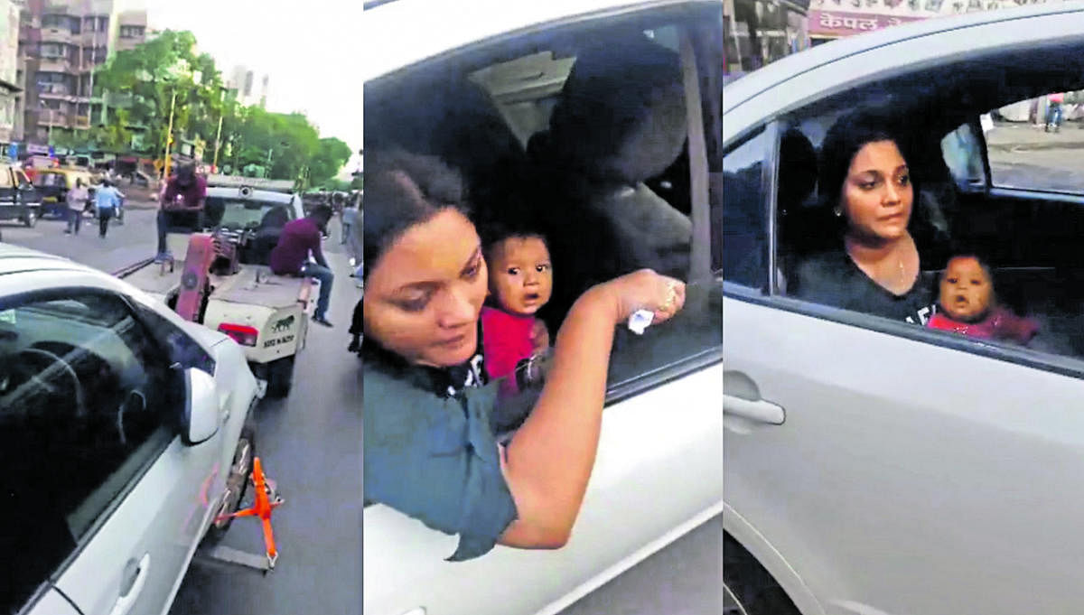MUMBAI SHOCKER: Cop tows vehicle as woman breastfeeds