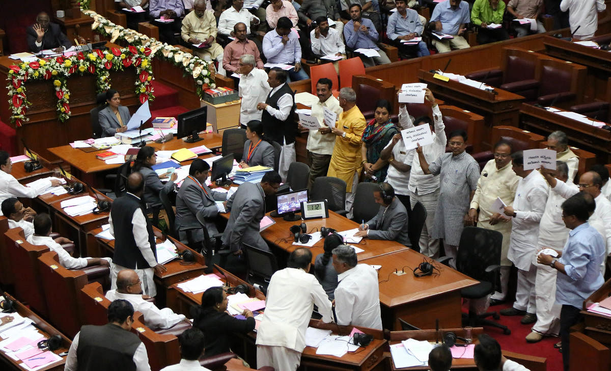 BJP members protest in the well of the Legislative Council on day one of the winter session at Suvarna Vidhana Soudha in Belagavi on Monday.
