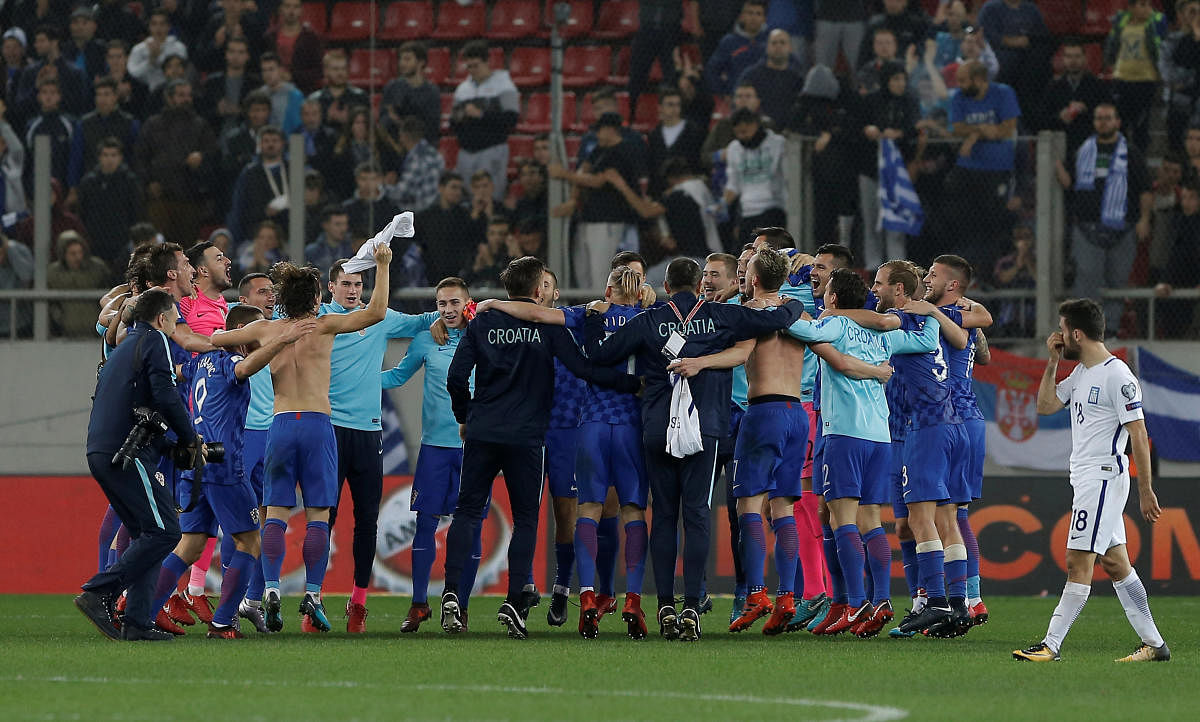 Croatian players celebrate after clinching their place in next year's World Cup in Russia. Reuters