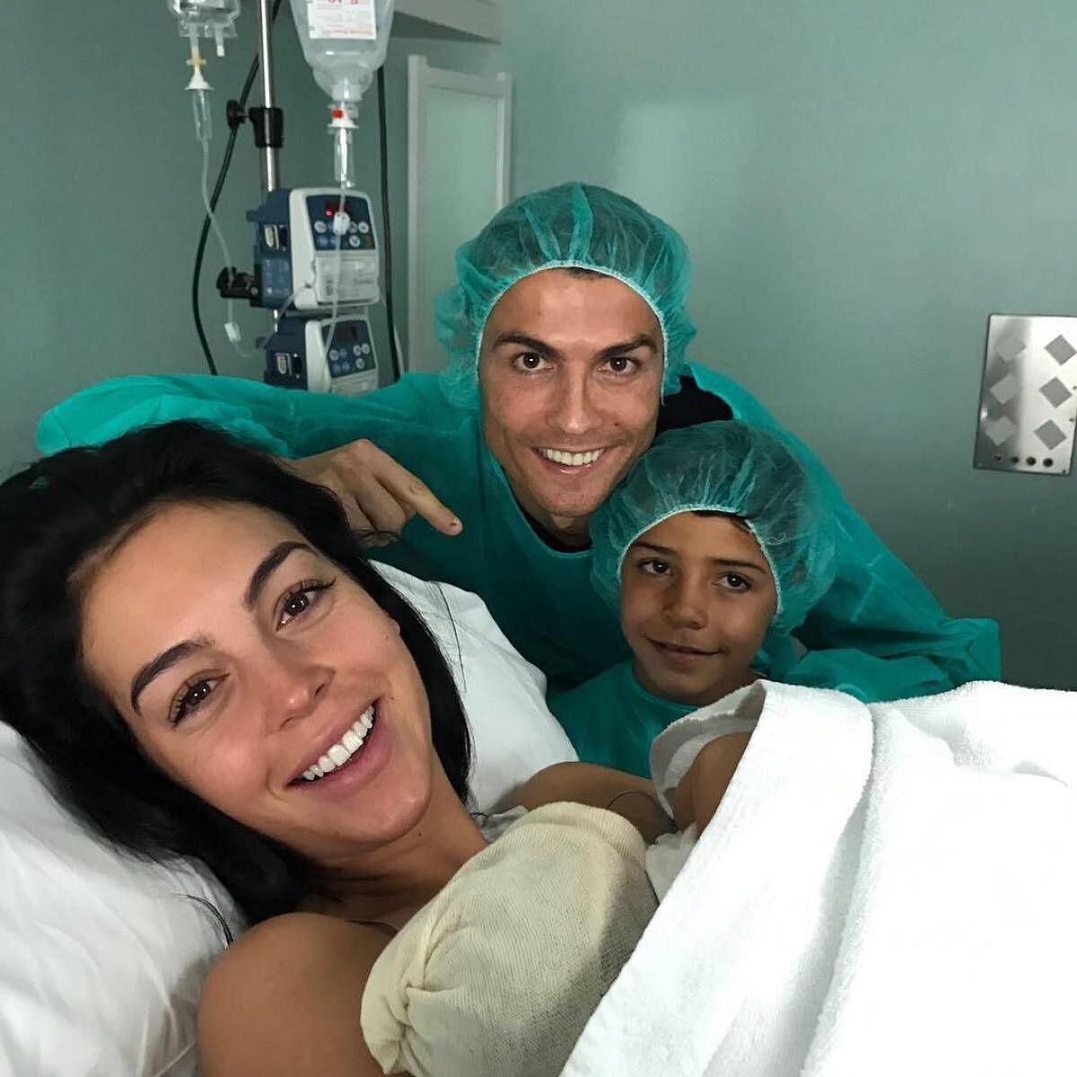 Real Madrid star Cristiano Ronaldo (centre) with his partner Georgina Rodriguez, son Cristiano Jr (right) and new born daughter Alana Martina. TWITTER