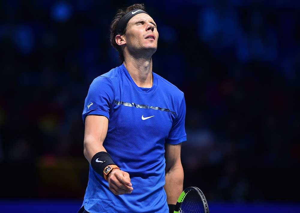BITTER END Rafael Nadal trudges off dejected after losing against Belgium's David Goffin. Nadal pulled out of the ATP World Tour Finals, citing failure to recover from injury. Reuters file photo