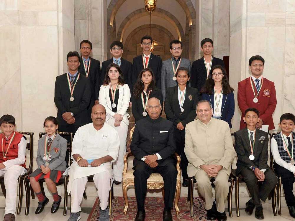 President Ram Nath Kovind in a group photograph with the awardees during the National Child Awards function on the occasion of Children's Day at Rashtrapati Bhavan in New Delhi on Tuesday. PTI