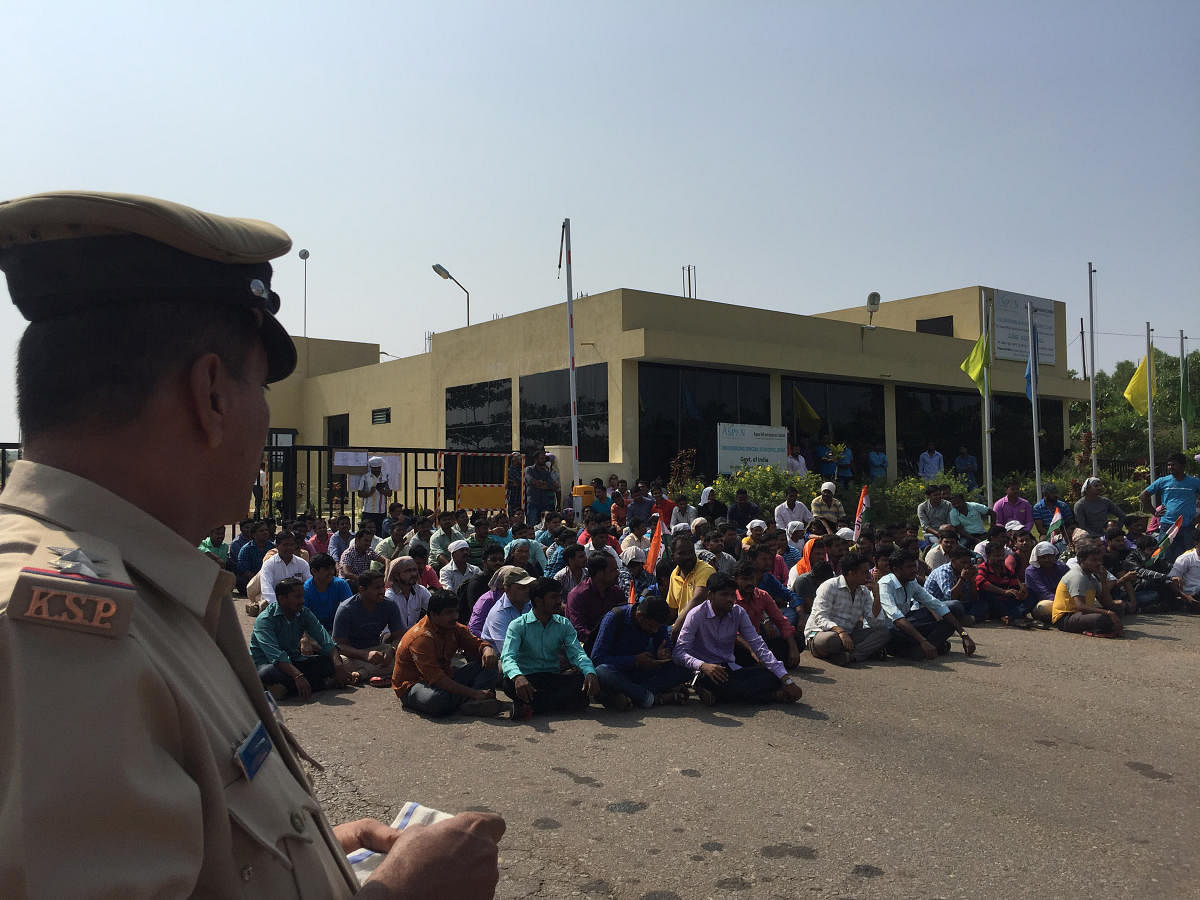 Workers stage a protest outside the Suzlon Energy Limited office at Padubidri in Udupi on Tuesday.