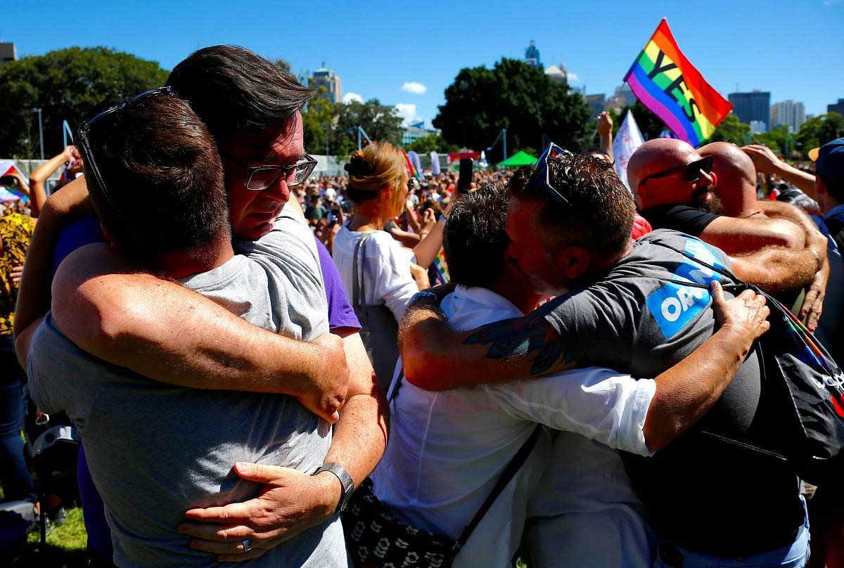 People celebrate after it was announced that majority of Australians support same-sex marriage in a national survey at a rally in central Sydney, Australia, on Wednesday. REUTERS