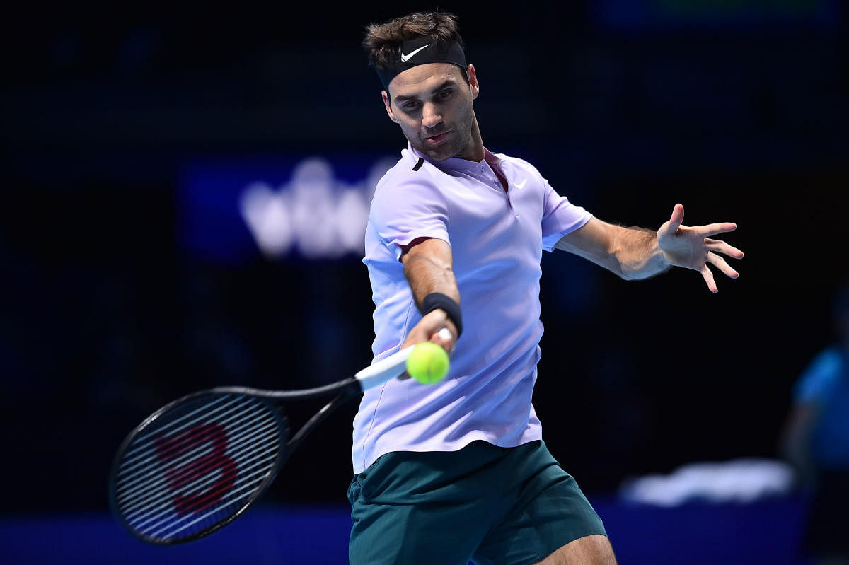 Federer wins 'generation' battle