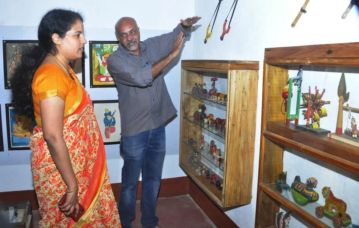 Deputy Commissioner Priyanka Mary Francis glancing at the Museum of Toys and Playthings at Manipal.