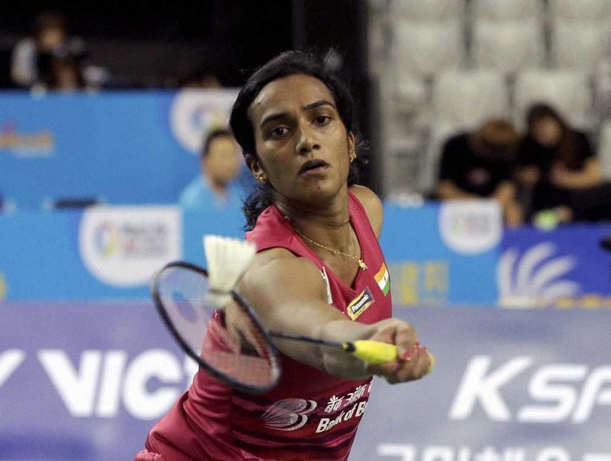 PV Sindhu managed to enter the quarterfinals, while Saina Nehwal and HS Prannoy bowed out. AP/PTI file photo.