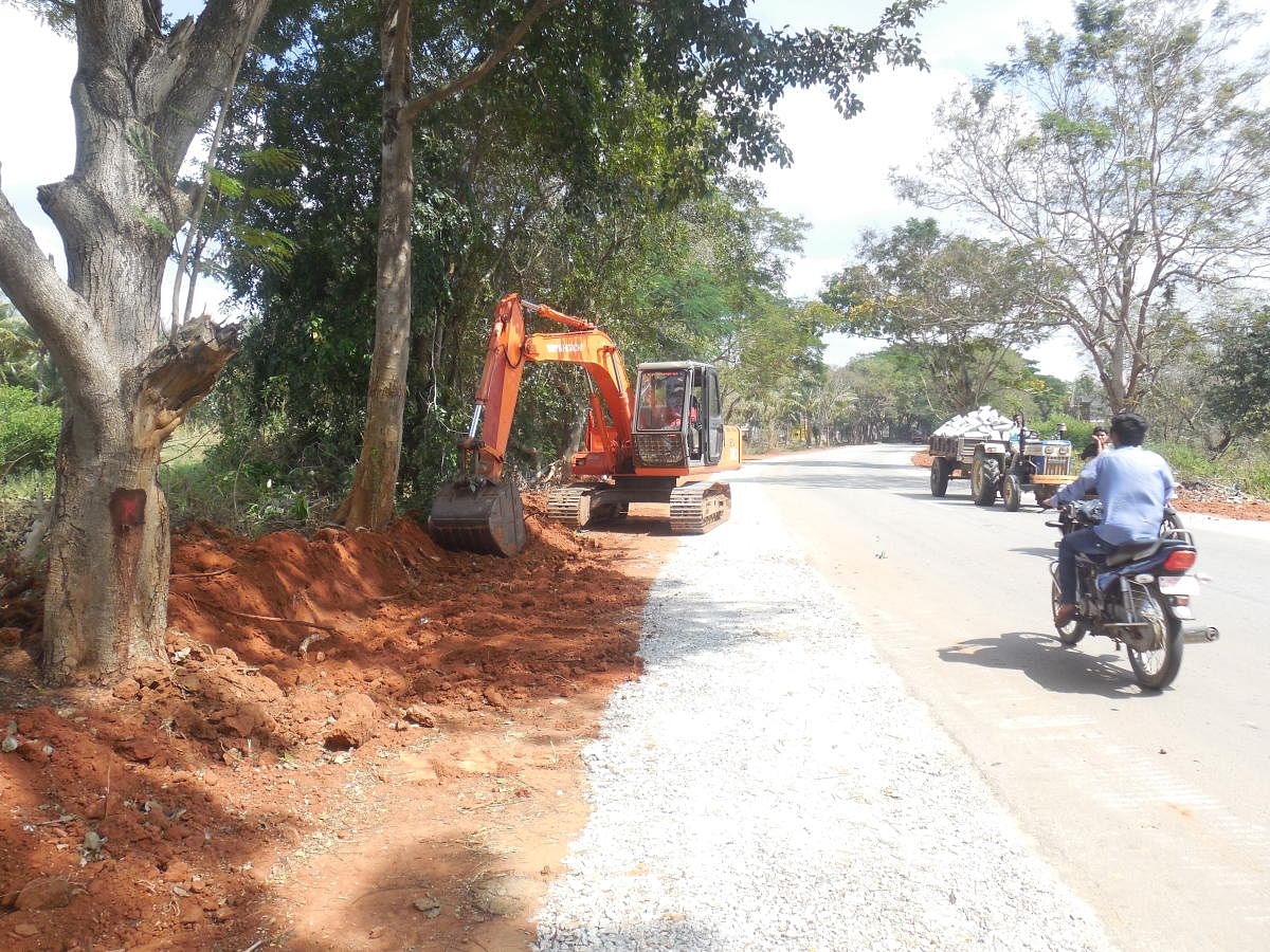 The road widening works under way near Hadenahalli between Shravanabelagola and Channarayapatna in Hassan district.
