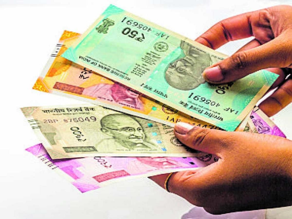 The rupee today appreciated a sharp 69 paise, or 1.06 percent, to trade at an over one-week high of 64.63 against the dollar after the US-based rating agency Moody's upgraded India's sovereign credit rating. DH File photo