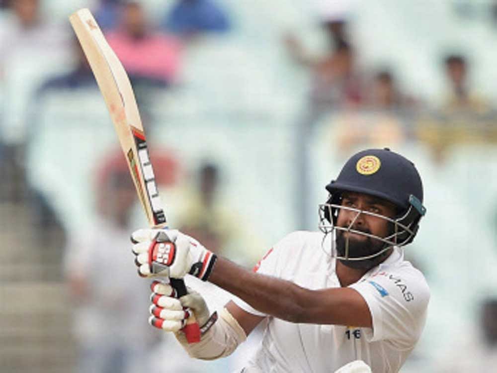 Sri Lankan batsman HDRL Thirimanne plays a shot during the third day of 1st cricket Test match against India at Eden Gardens, in Kolkata on Saturday. PTI Photo