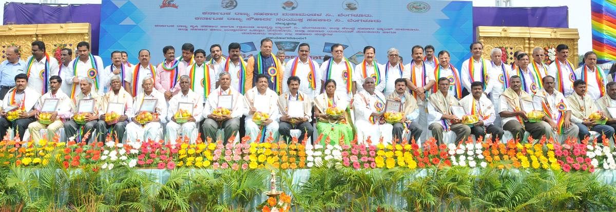 Members of co-operative socieities were felicated at a programme organised as part of 64th All India Co-operative Week in Tumakuru on Saturday. DH photo
