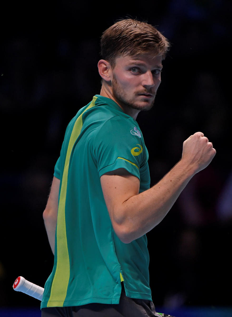 STUNNER! Belgium's David Goffin celebrates after winning the crucial second set against Roger Federer on Saturday. REUTERS