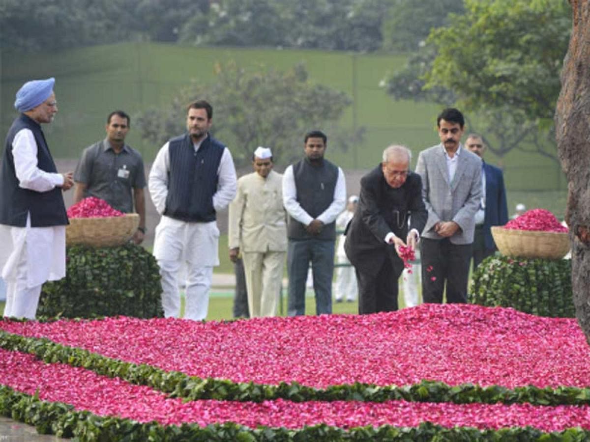 Former President Pranab Mukherjee with former Prime Minister Manmohan Singh and Congress vice-president Rahul Gandhi paying homage to Indira Gandhi on her 100th birth anniversaryt at Shakti Sthal in New Delhi on Sunday.