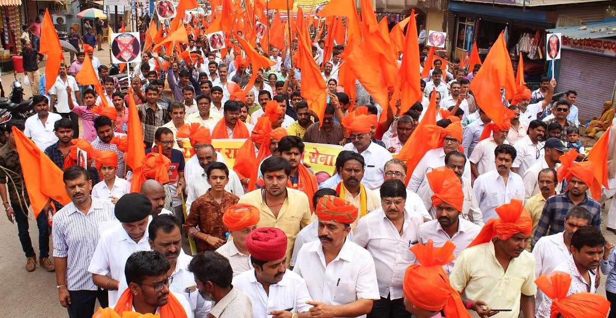 Rajput community members take out protest rally in Hubballi on Sunday.