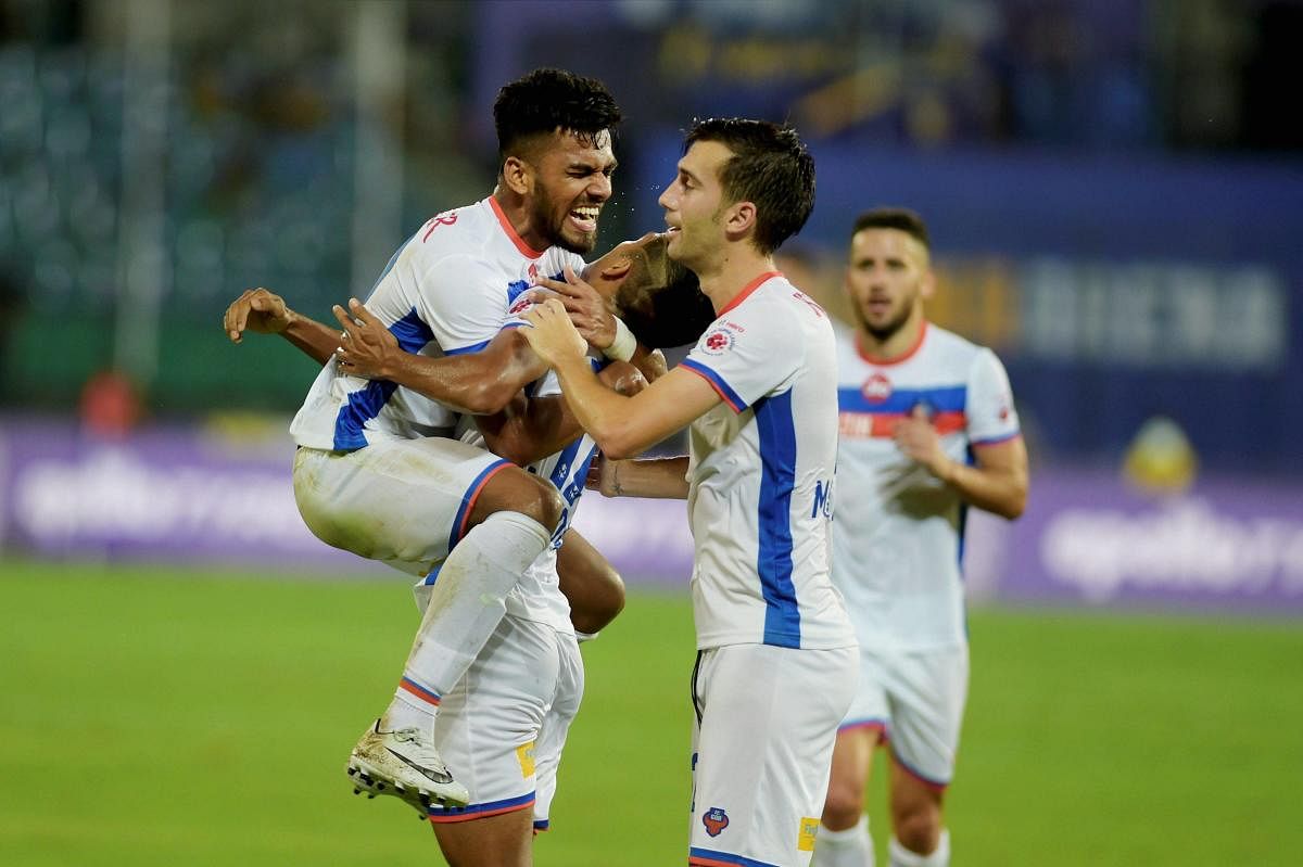 Chennai: FC Goa (in white jersey) player Mandar Dessai celebrating with teammates after scoring a goal against Chennaiyin FC during the Indian Super League (ISL) match in Chennai on Sunday. PTI Photo by R Senthil Kumar (PTI11_19_2017_000213B)