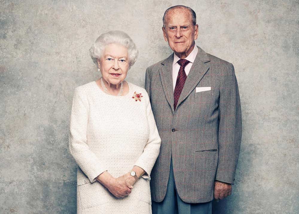 A handout photo shows Britain's Queen Elizabeth and Prince Philip in the White Drawing Room at Windsor Castle in early November, pictured against a platinum-textured backdrop, in celebration of their platinum wedding anniversary. Reuters Photo