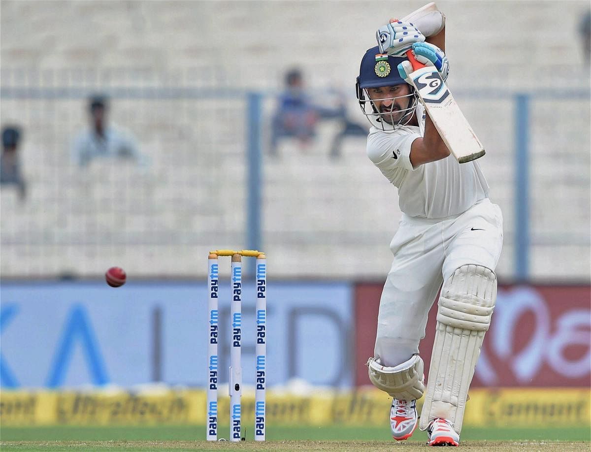 Indian batsman Cheteshwar Pujara become the third Indian to bat on all five days of a Test matc. PTI