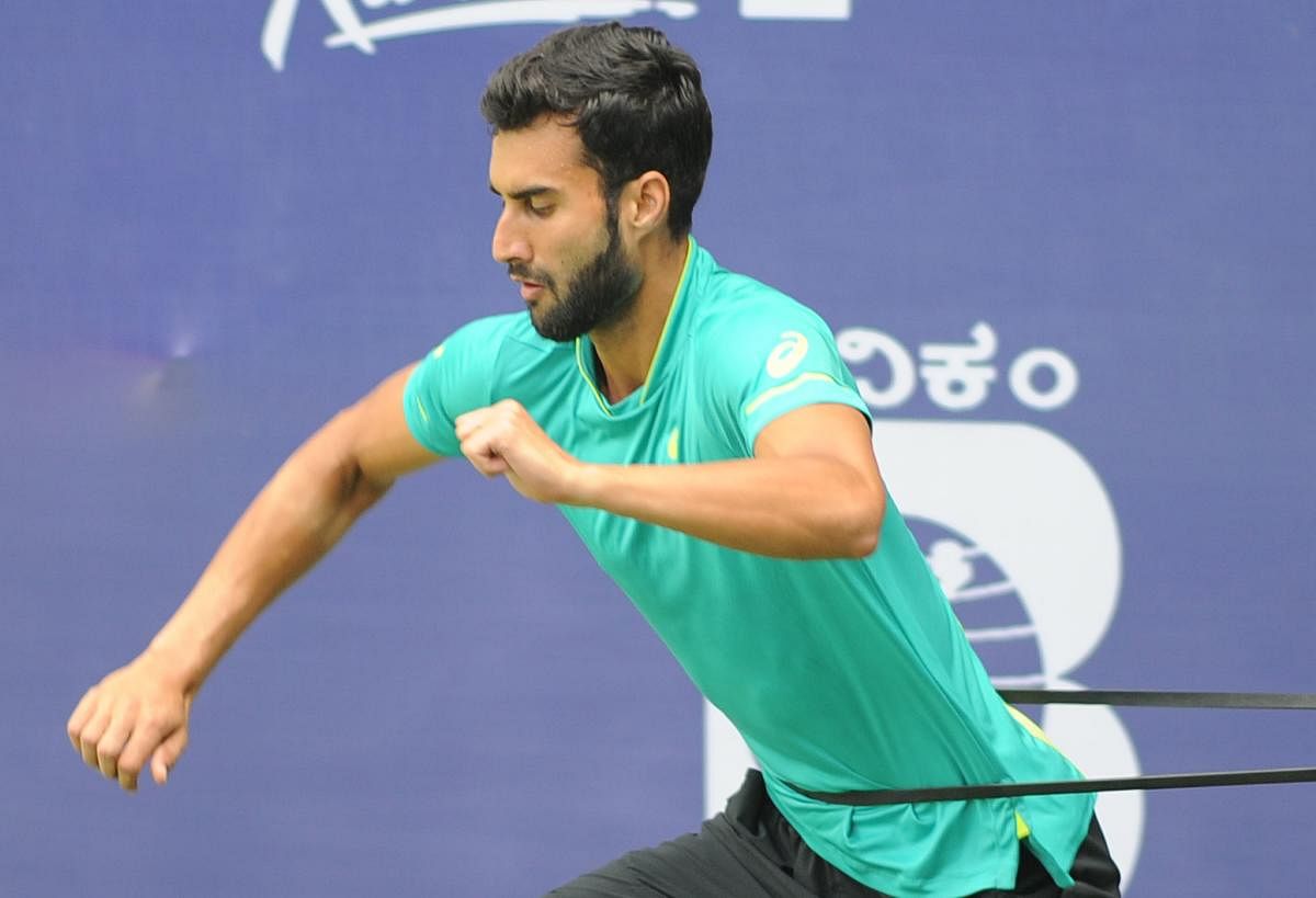 With a place in the main draw of next year's Australian Open in sight, Yuki Bhambri is hoping for a good show at the Bengaluru Open ATP Challenger event. DH Photo/ Srikanta Sharma R