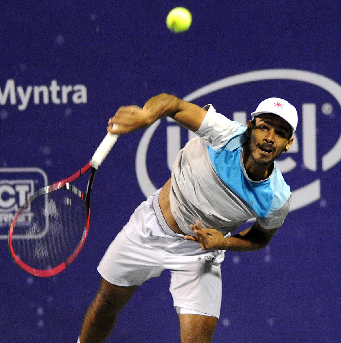 Sumit Nagal of India in action against Brydan Klein of GBR in the mens singles 2nd round of the Bengaluru Open ATP Tennis Championship at KSLTA Courts in Bengaluru on Wdnesday.
