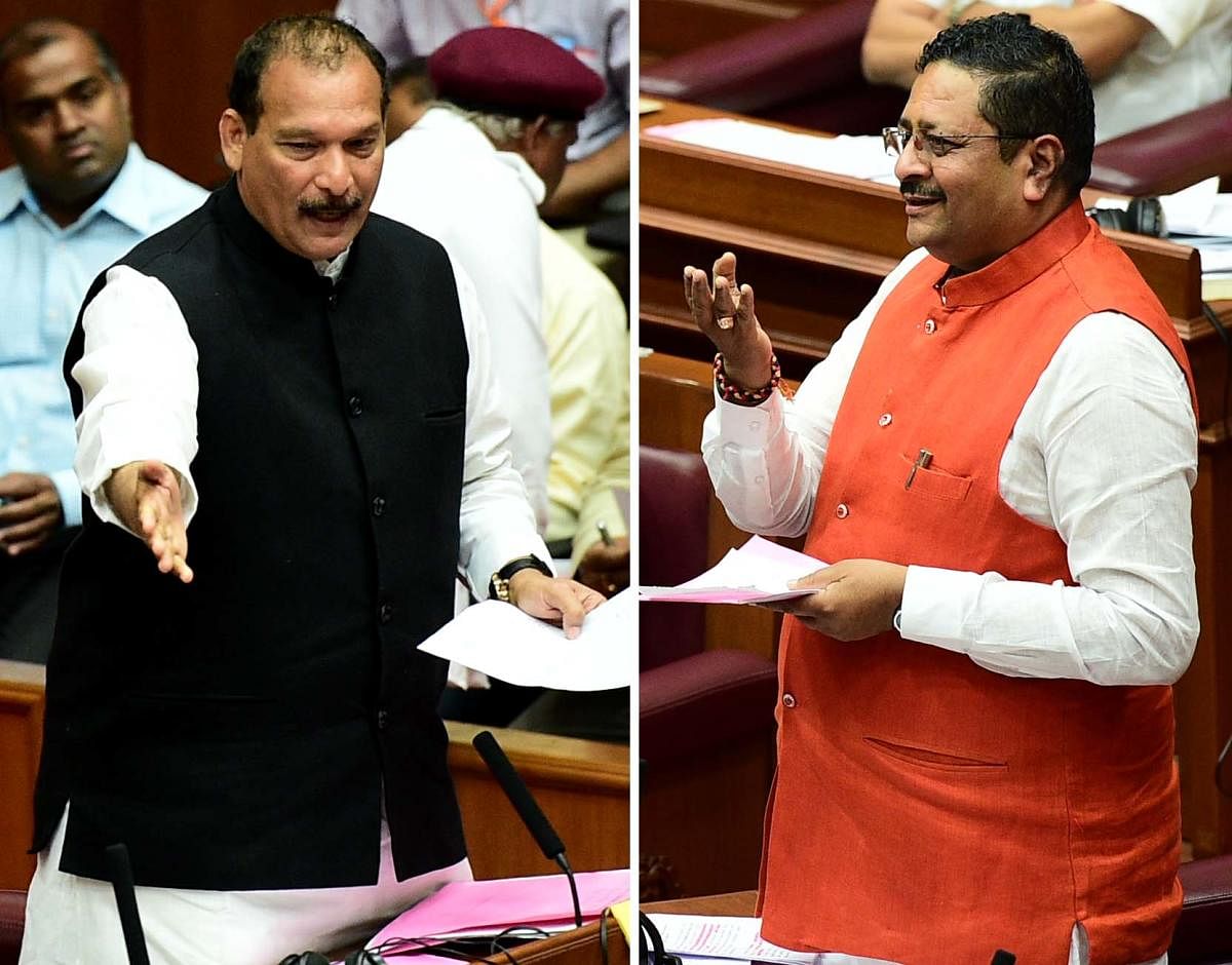 Ivan D'Souza (Cong) and Bavasanagouda Patil Yatnal (Ind) during a discussion on anti-superstition bill in the Legislative Council in Belagavi on Wednesday. DH Photo.