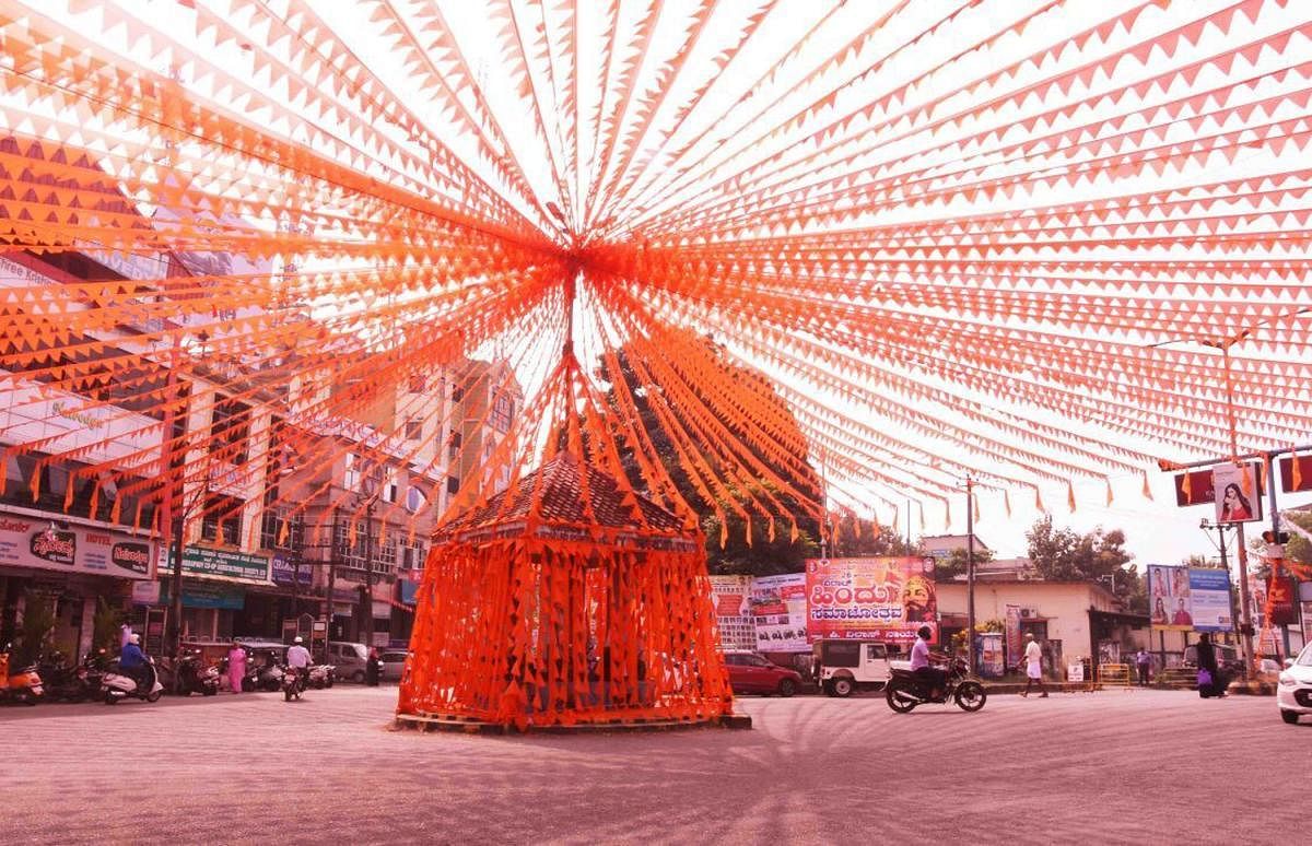 Saffron buntings adorn the Circle in front of a Canara Bank in Udupi as a preparation for Dharma Samsad at Udupi in Udupi from November 24.
