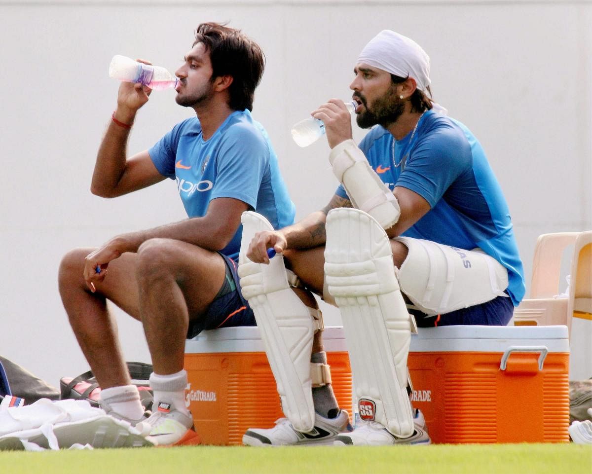 India's Murali Vijay (right) and Vijay Shankar at a practice session in Nagpur on Wednesday. PTI