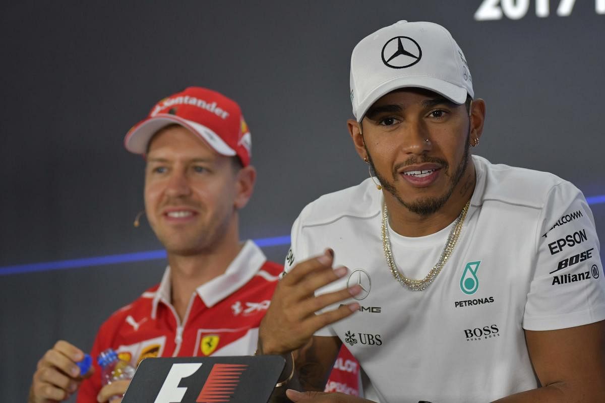 NO LOVE LOST Mercedes' Lewis Hamilton (right) and Ferrari's Sebastian Vettel promised a competitive 2018 season as they eye a fifth world title. AFP
