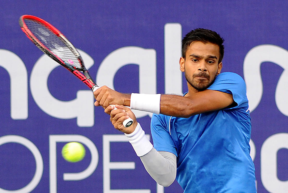 Sumit Nagal of India en route to his win against compatriot Yuki Bhambri in the men's singles semifinal in Bengaluru on Friday. DH Photo/ Srikanta Sharma R