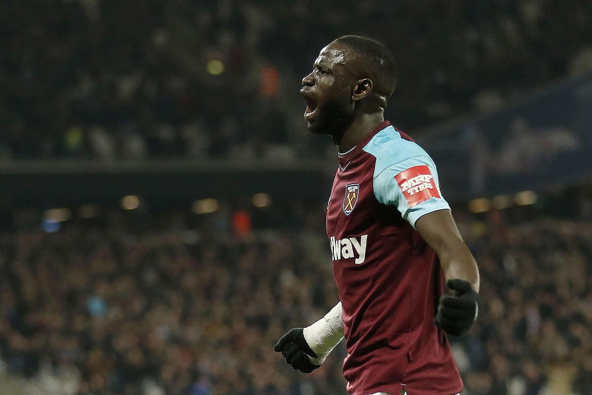 KEY STRIKE West Ham United's Cheikhou Kouyate celebrates after scoring against Leicester City on Saturday. AFP