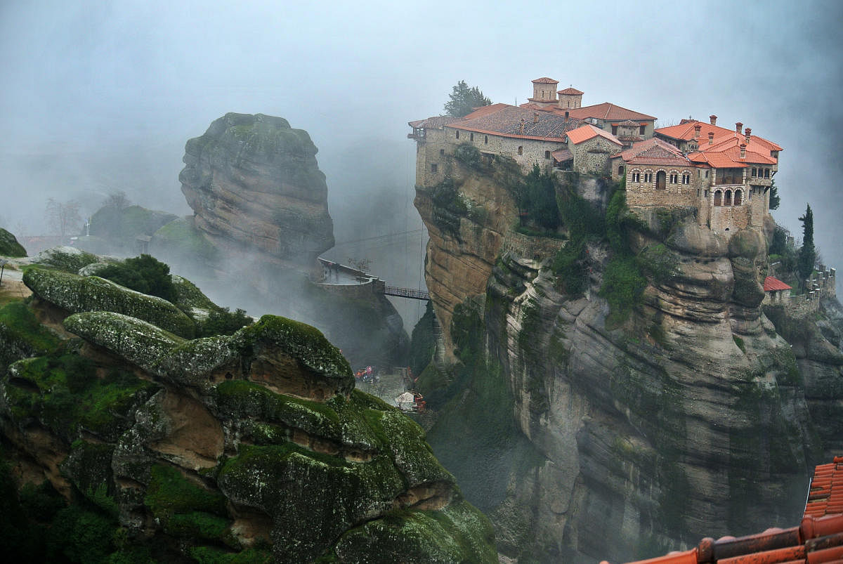 A monastery on top of a rock at Meteora, a village located in Central Greece.