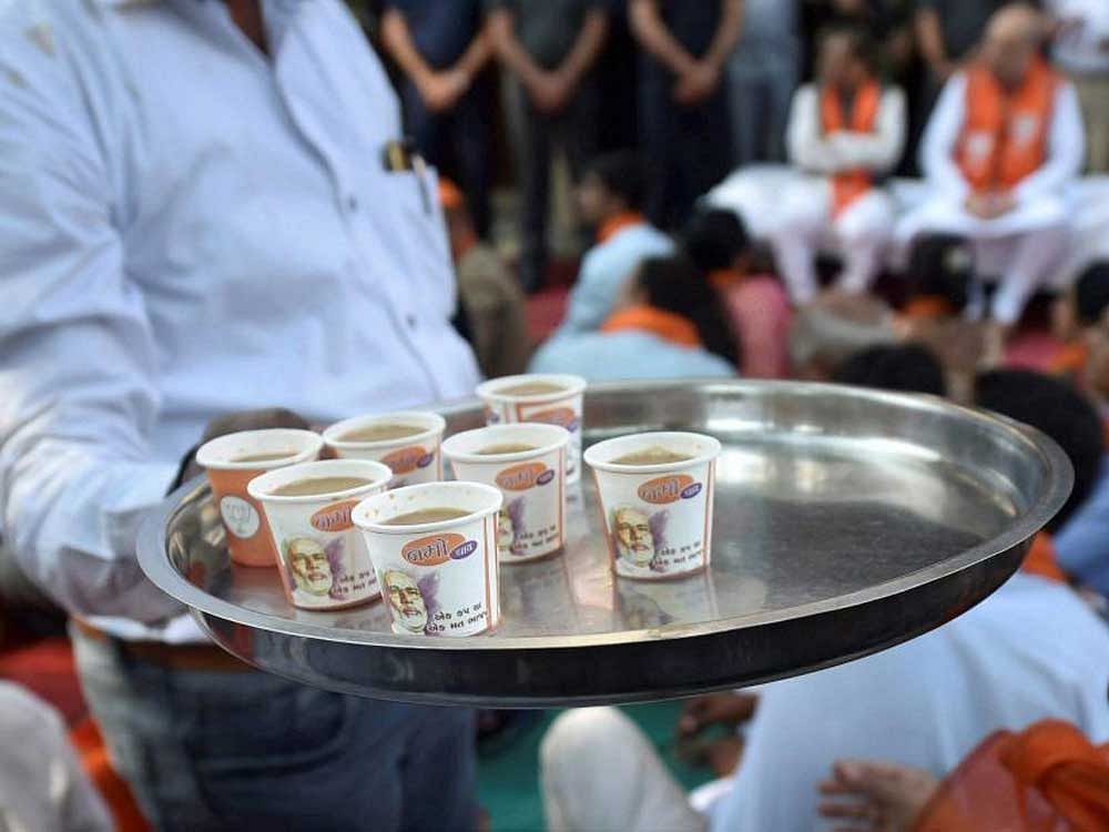 The BJP organised 'Mann ki Baat, Chai ke Saath', at all 50,128 polling booths in 182 Assembly seats. PTI Photo