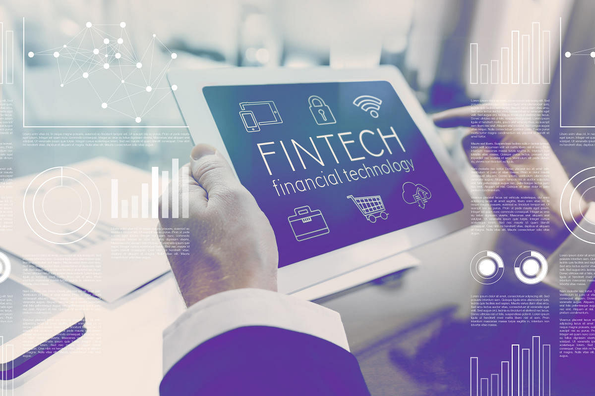 Financial technology fintech concept businessman using digital tabletFinTech