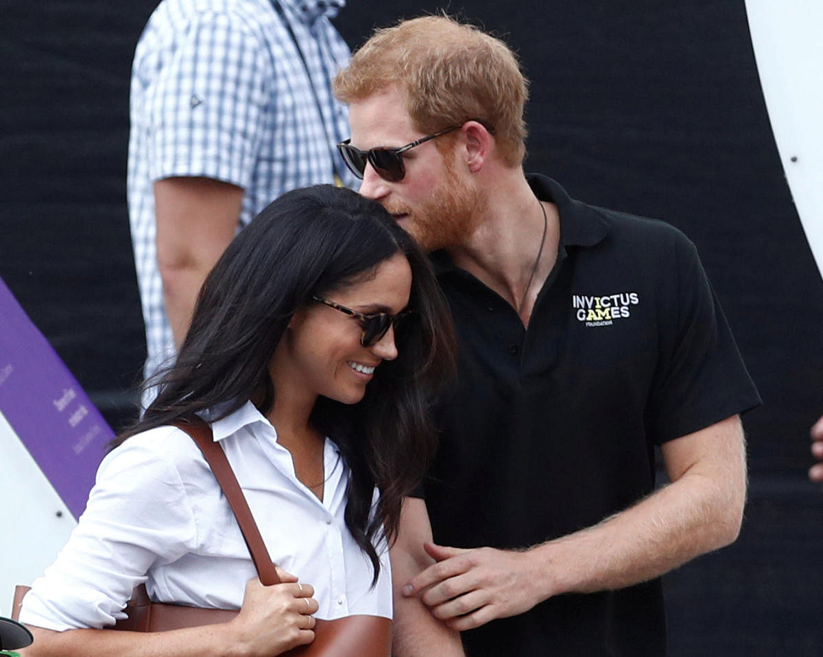 Britain's Prince Harry (right) with actor Meghan Markle. REUTERS FILE PHOTO