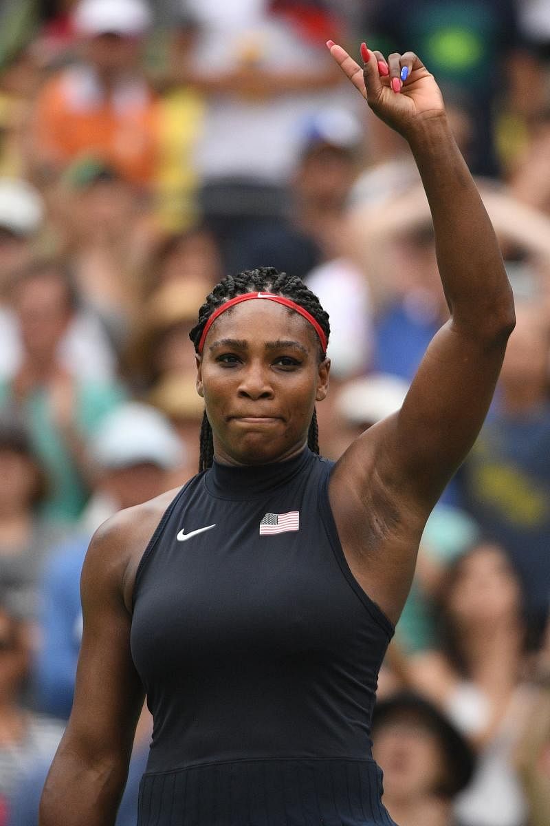 This file photo taken on August 07, 2016 shows USA's Serena Williams react after winning her women's first round singles tennis match against Australia's Daria Gavrilova at the Olympic Tennis Centre of the Rio 2016 Olympic Games in Rio de Janeiro. Tennis superstar Serena Williams -- whose absence from women's tennis has shaken up the game -- has gone into labor at a clinic in West Palm Beach, Florida, local media reported on September 1, 2017. Williams, who will turn 36 later this week, was admitted Wednesday to St Mary's Medical Center, which shut down an entire floor to provide security for the megastar, the local CBS affiliate said. AFP PHOTO / Roberto SCHMIDT