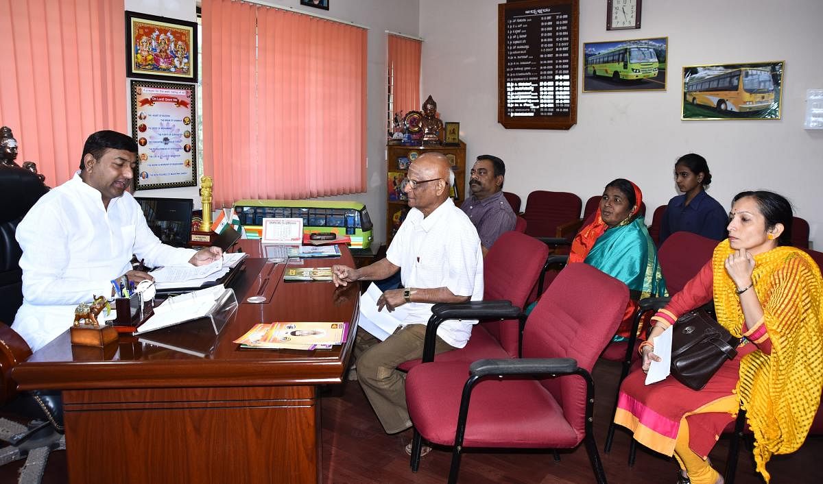 NWKRTC Chairman Sadanand Danganavar receives suggestions and grievances during the inaugural monthly interaction with senior citizens and women, at the NWKRTC central office on Gokul Road in Hubballi on Wednesday.