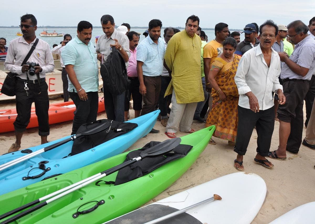 District-in-Charge Minister Pramod Madhwaraj having a look at the various facilities available at St Mary's island near Malpe on Thursday.