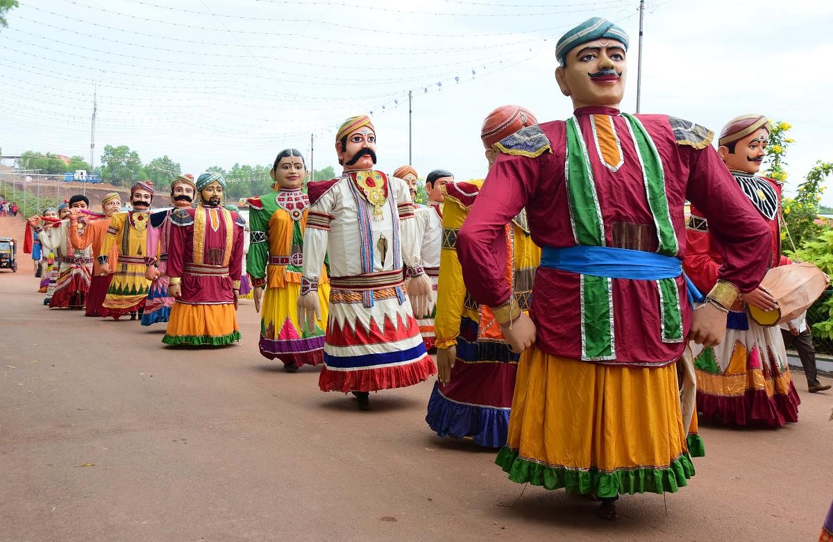 Colourful dolls in the procession prior to the inauguration of 14th edition of Alva's Nudusiri, in Moodbidri on Friday.