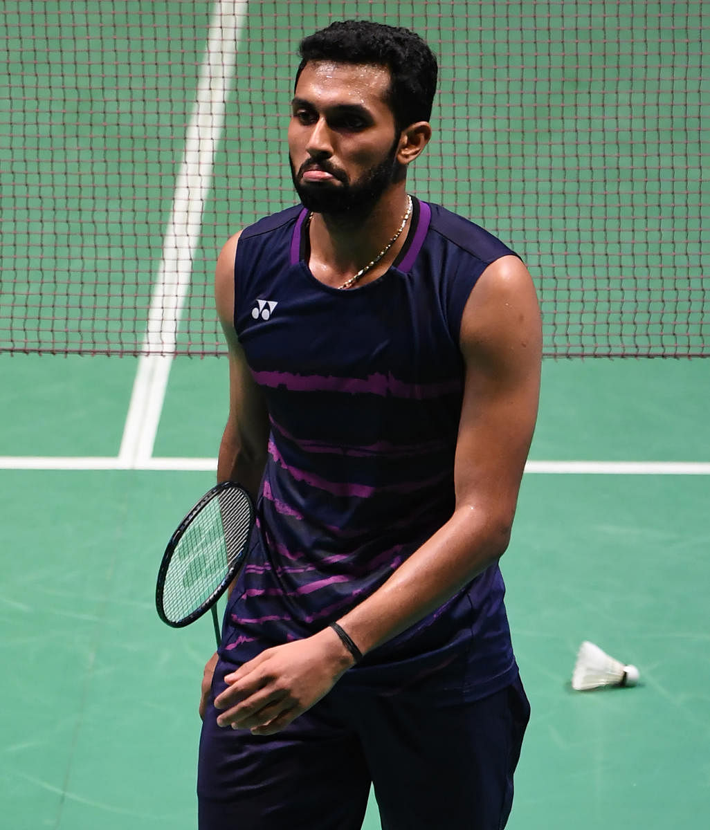H.S Prannoy of India shows his flastration during the men's singles quarter-final match against Shi Yuqi of China at the Japan Open Badminton Championships in Tokyo on September 22, 2017. / AFP PHOTO / TOSHIFUMI KITAMURA