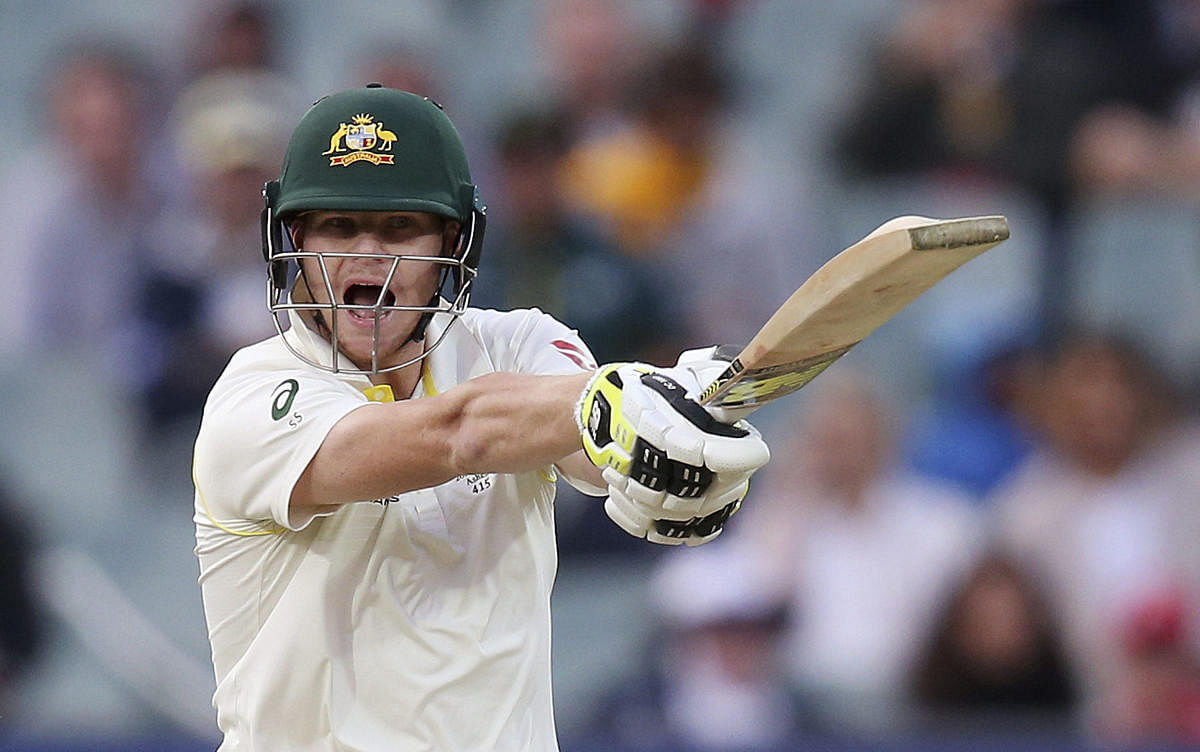 Australia's Steve Smith yells to his batting partner during their Ashes Test match against England in Adelaide. AP/PTI