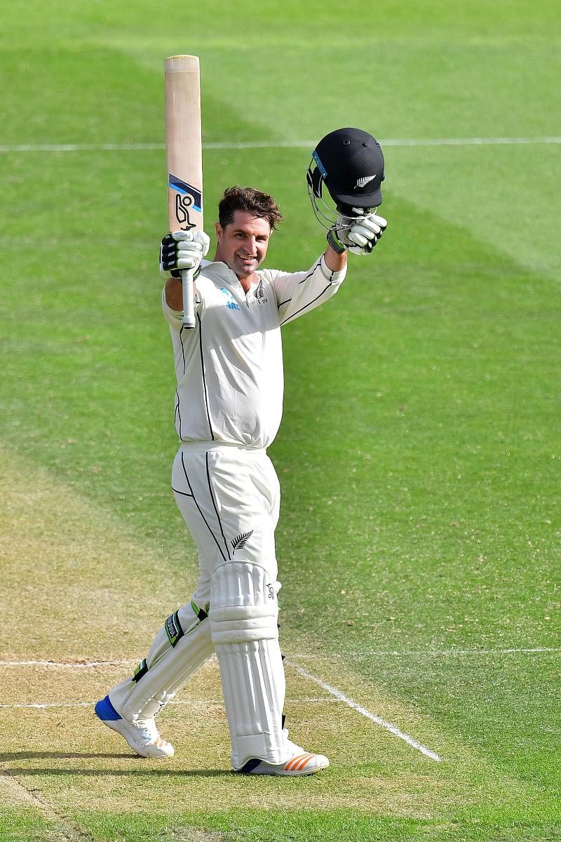New Zealand's Colin de Grandhomme celebrates his ton against the West Indies on the second day of the first Test at the Basin Reserve in Wellington on Saturday. AFP